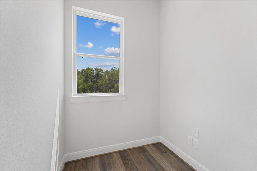 Spacious, unfurnished interior of a new home in The Corner At Buffalo Pointe, Houston (Image 20).