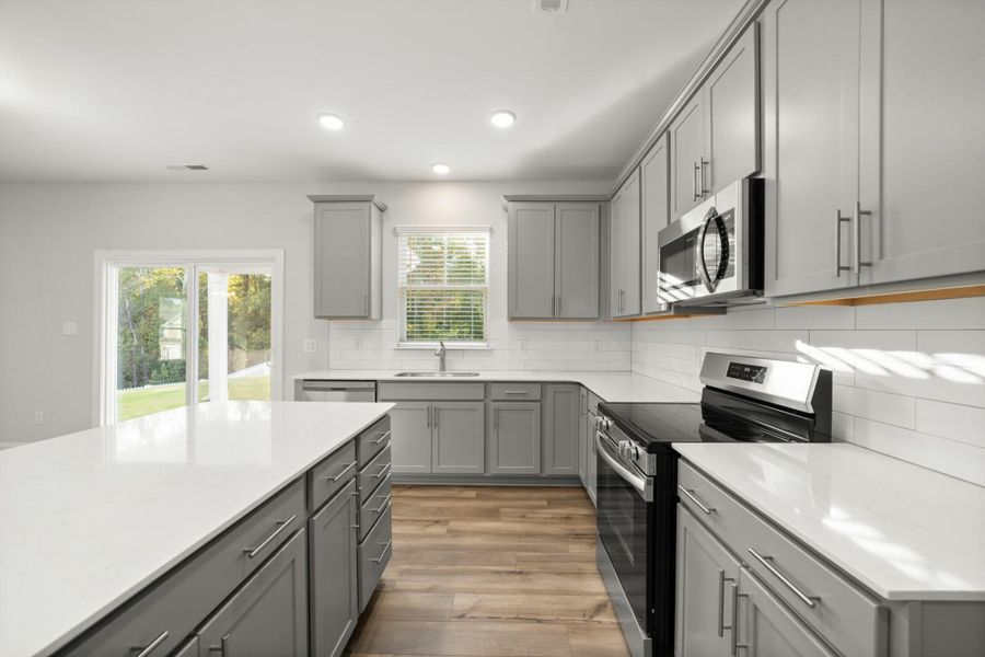 Furnished interior view inside a new home in Cottages at Piper Village, Trinity (Image 10).