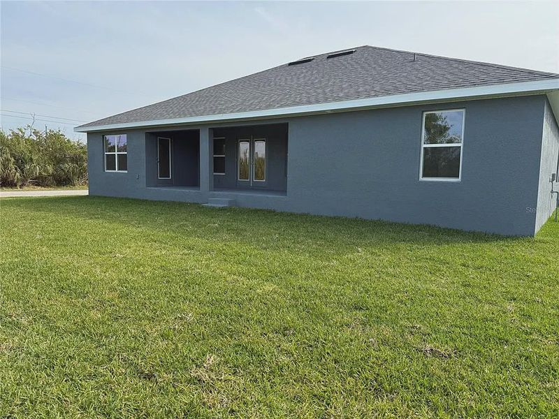 Exterior details and patio area of a home in South Gulf Cove, Port Charlotte (Image 3).