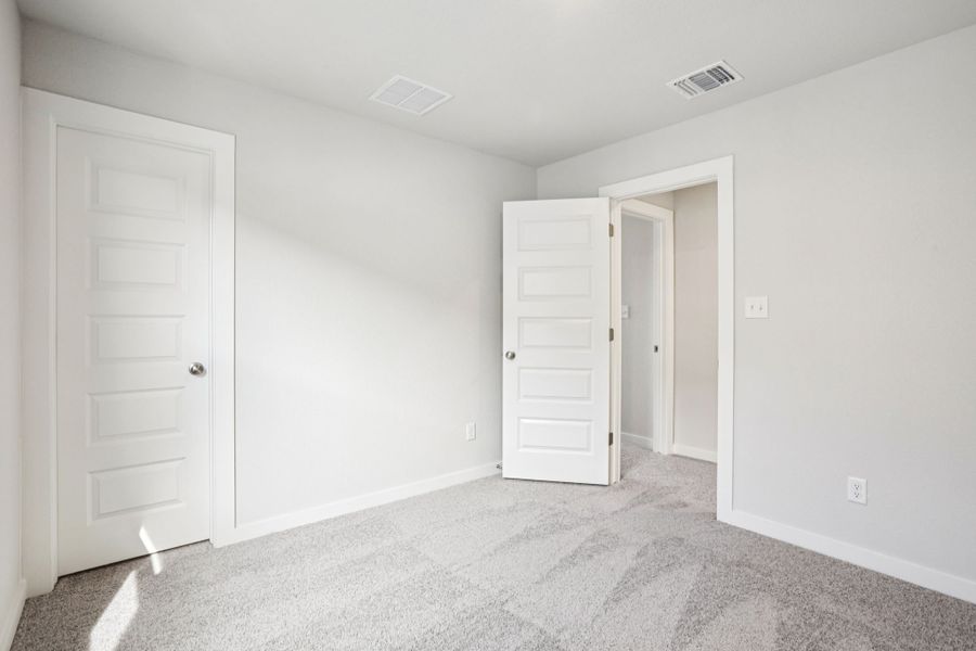 A room with white doors.