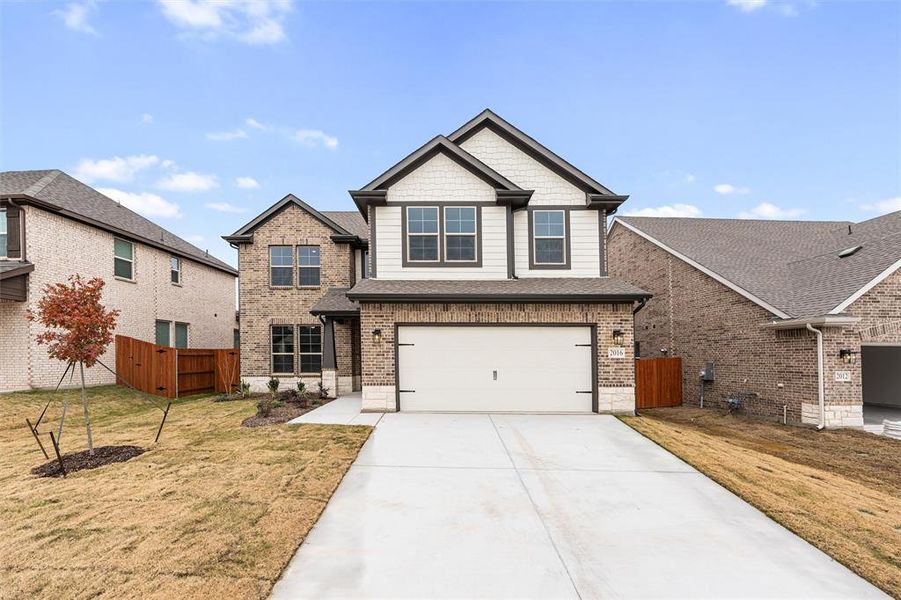 Front exterior of a new home in Northstar, Haslet, TX, highlighting curb appeal (Image 21).