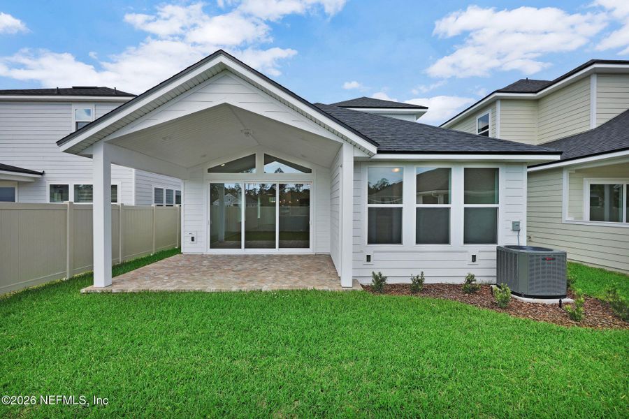 Exterior details and patio area of a home in Seabrook Village at Seabrook, Nocatee (Image 30).