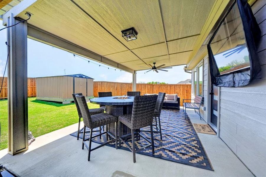 Covered patio with a mounted ceiling fan, recessed lighting, and string lighting