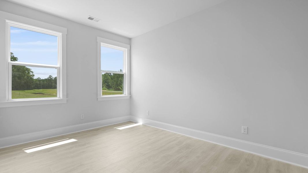 Spacious, unfurnished interior of a new home in Berkeley Bay, Ridgeville (Image 32).