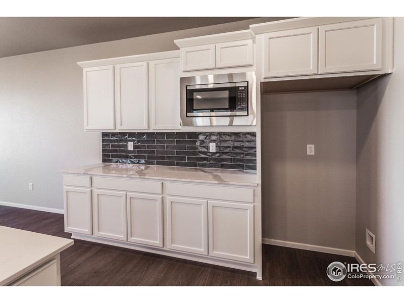 Furnished interior view inside a new home in Trailside Alley Load - Single Family Homes, Timnath (Image 12).