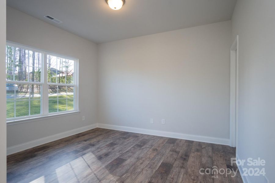 Living Room with Walk in Closet. Representative Photograph - Colors/Options may vary.