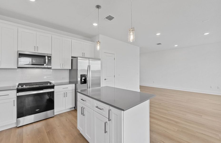 Furnished interior view inside a new home in Crosswinds, Kyle (Image 9).