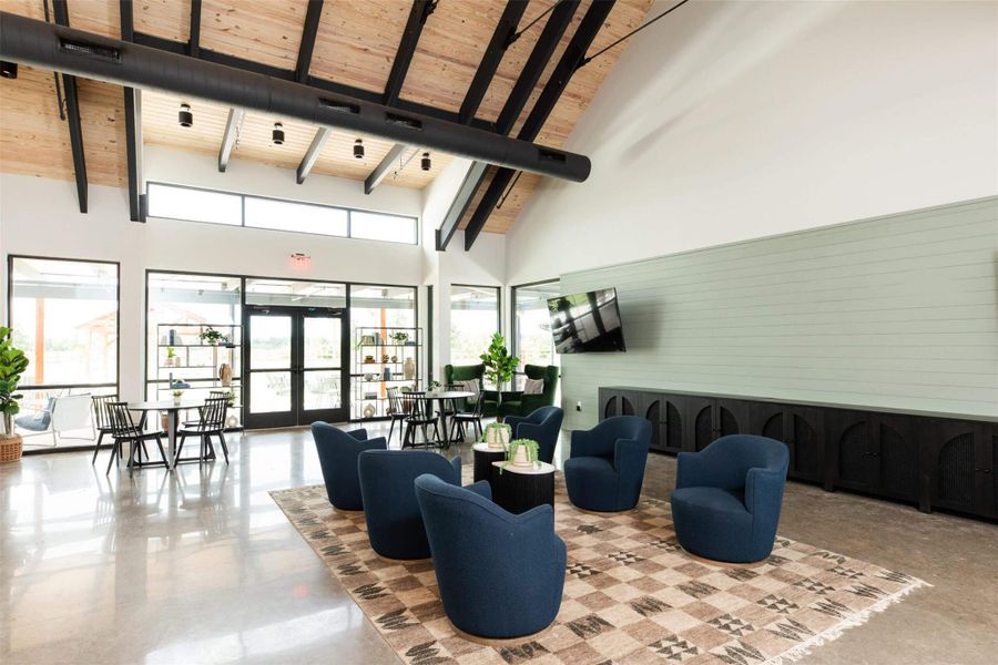 Community clubhouse with comfortable seating and spacious gathering areas. Community clubhouse with comfortable seating and spacious gathering areas.