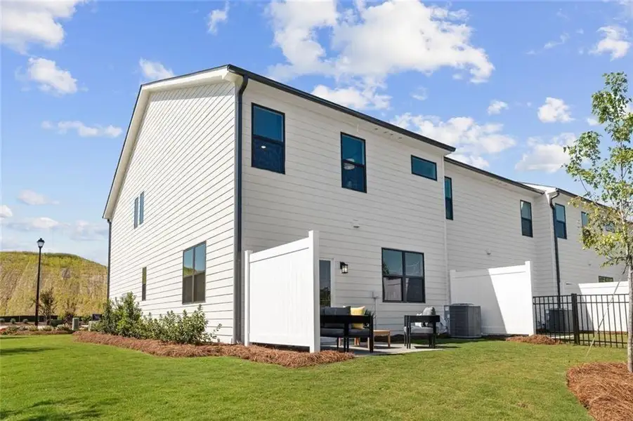 Exterior details and patio area of a home in Sherwood Square, Flowery Branch (Image 4).