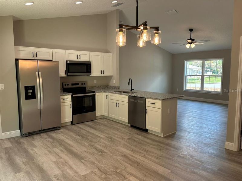 Furnished interior view inside a new home in , Dunnellon (Image 7).