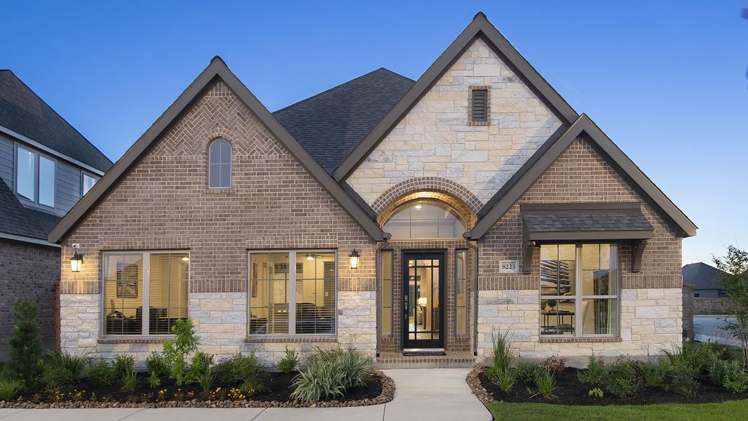Front exterior of a new home in Candela, Richmond, TX, highlighting curb appeal (Image 26).