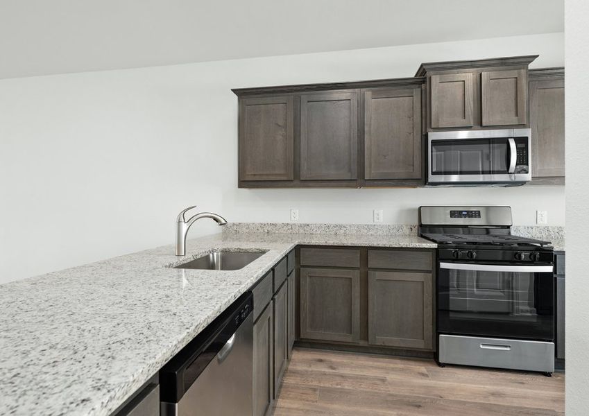 The kitchen of the Driftwood has beautiful granite countertops. The kitchen of the Driftwood has beautiful granite countertops.