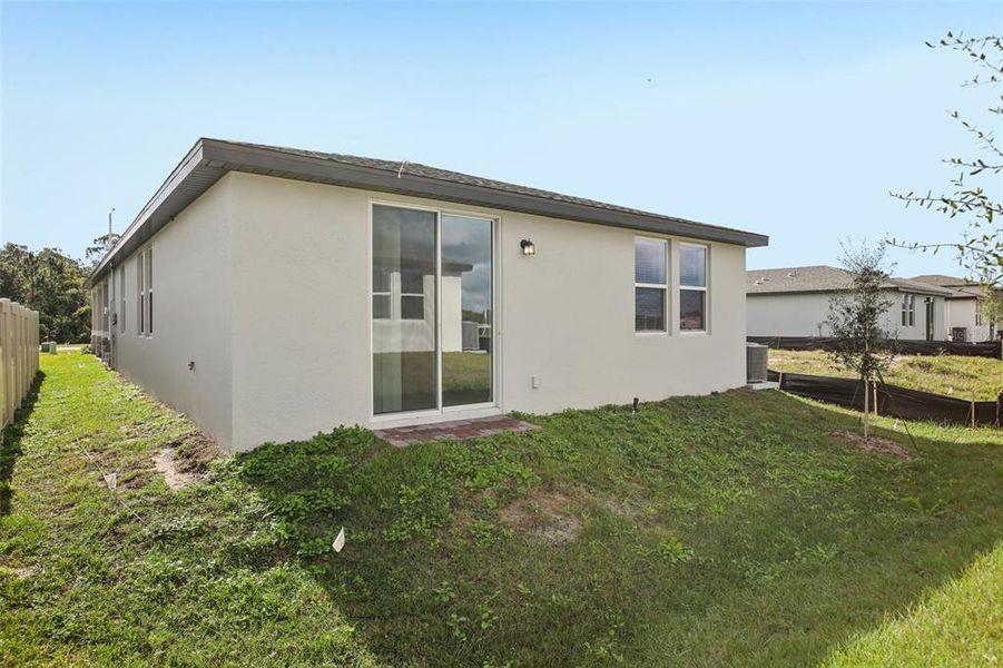 Exterior details and patio area of a home in Villamar - Classic Series, Winter Haven (Image 3).