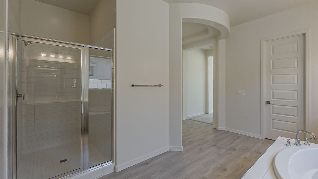 Furnished interior view inside a new home in Windrose, Waddell (Image 32).