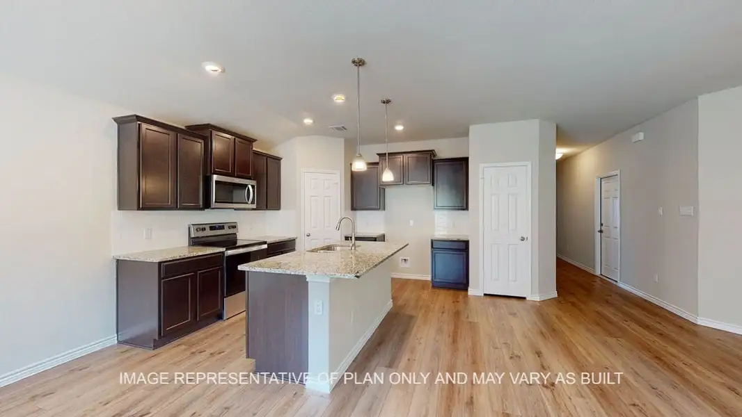 Furnished interior view inside a new home in Creekfall, Burnet (Image 4).