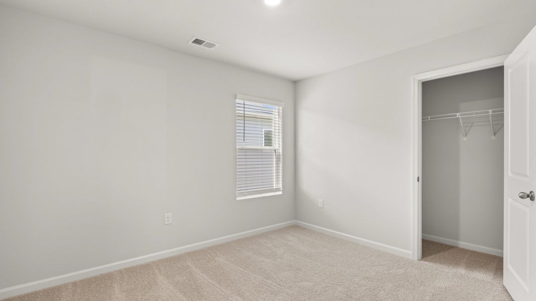 Representative unfurnished interior of a home built from the Somerset by D.R. Horton in Highland Hills, Graniteville (Image 18).