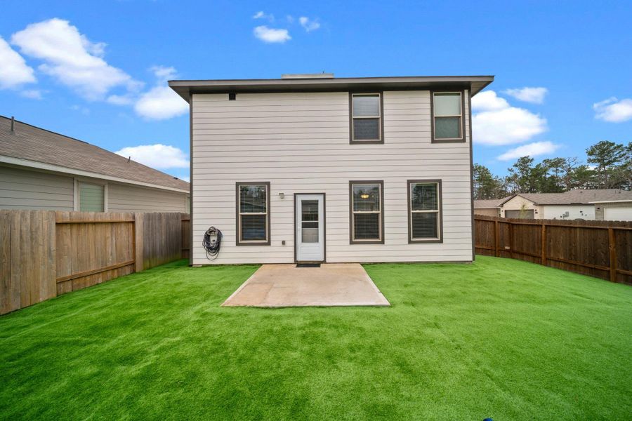 Front exterior of a new home in , Porter, TX, highlighting curb appeal (Image 24). Front exterior of a new home in , Porter, TX, highlighting curb appeal (Image 24).