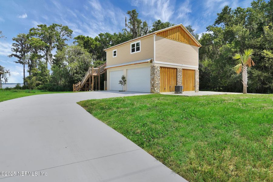 Front exterior of a new home in , East Palatka, FL, highlighting curb appeal (Image 32). Front exterior of a new home in , East Palatka, FL, highlighting curb appeal (Image 32).
