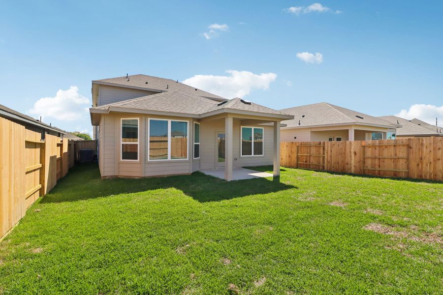 Exterior details and patio area of a home in Sanford Farms - Premier Series, Waller (Image 4).