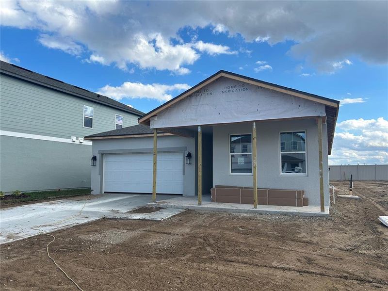 In-progress construction of a new home in Oakfield Trails, Parrish, FL (Image 19).
