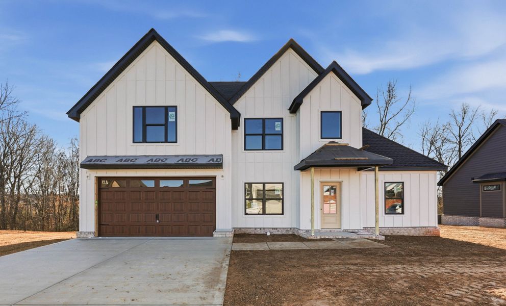 Front exterior of a new home in Bellshire, Clarksville, TN, highlighting curb appeal (Image 1). Front exterior of a new home in Bellshire, Clarksville, TN, highlighting curb appeal (Image 1).