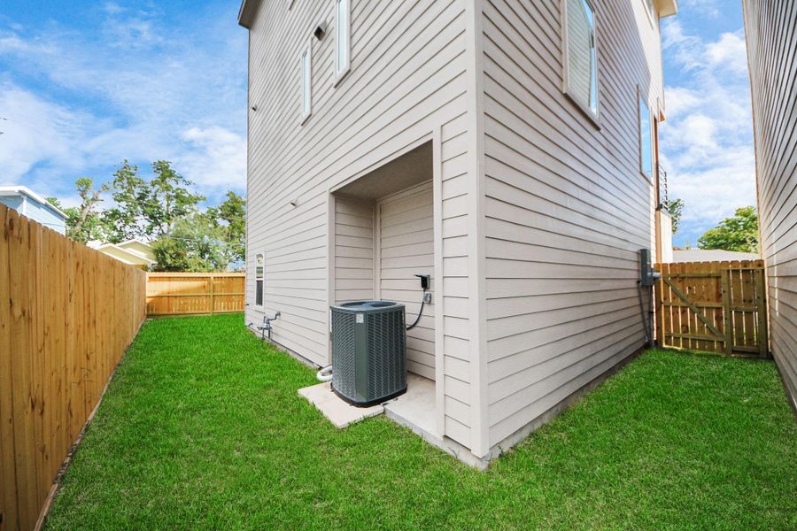 Exterior details and patio area of a home in , Houston (Image 24). Exterior details and patio area of a home in , Houston (Image 24).