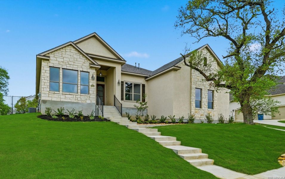 Front exterior of a new home in , Bulverde, TX, highlighting curb appeal (Image 23). Front exterior of a new home in , Bulverde, TX, highlighting curb appeal (Image 23).