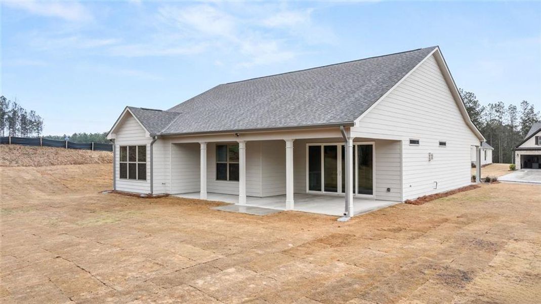 Exterior details and patio area of a home in Soleil Belmont Park, Canton (Image 27).