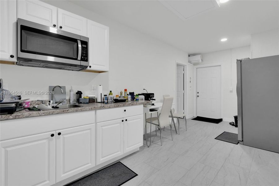 Furnished interior view inside a new home in , Lehigh Acres (Image 13).