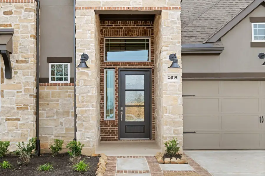 Representative exterior details of a home built from the Rivers 60′ Lot by Chesmar Homes in Fulshear Lakes, Fulshear (Image 3).