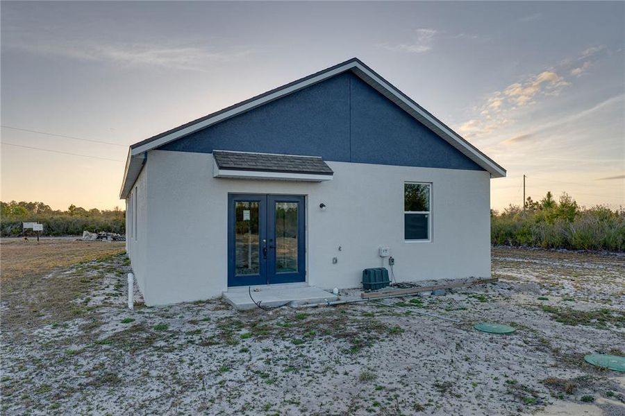 Exterior details and patio area of a home in , Indian Lake Estates (Image 16).