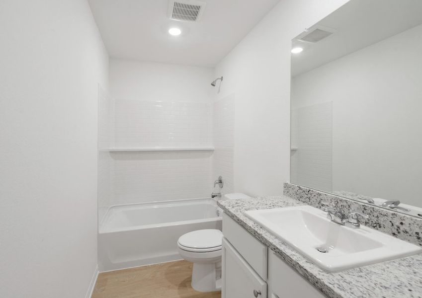 Secondary bathroom with a shower/tub combination Secondary bathroom with a shower/tub combination