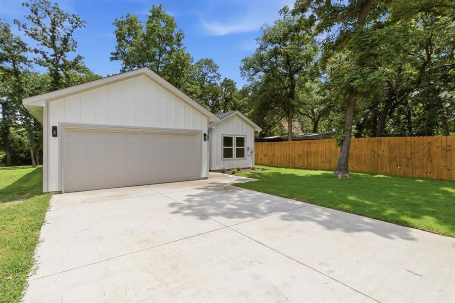 Front exterior of a new home in , Log Cabin, TX, highlighting curb appeal (Image 21).