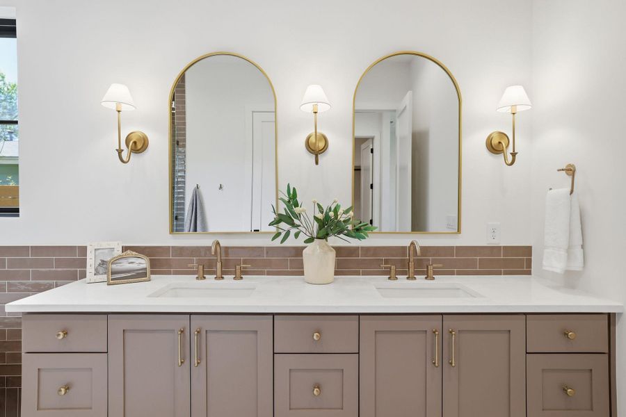 Full bathroom featuring double vanity