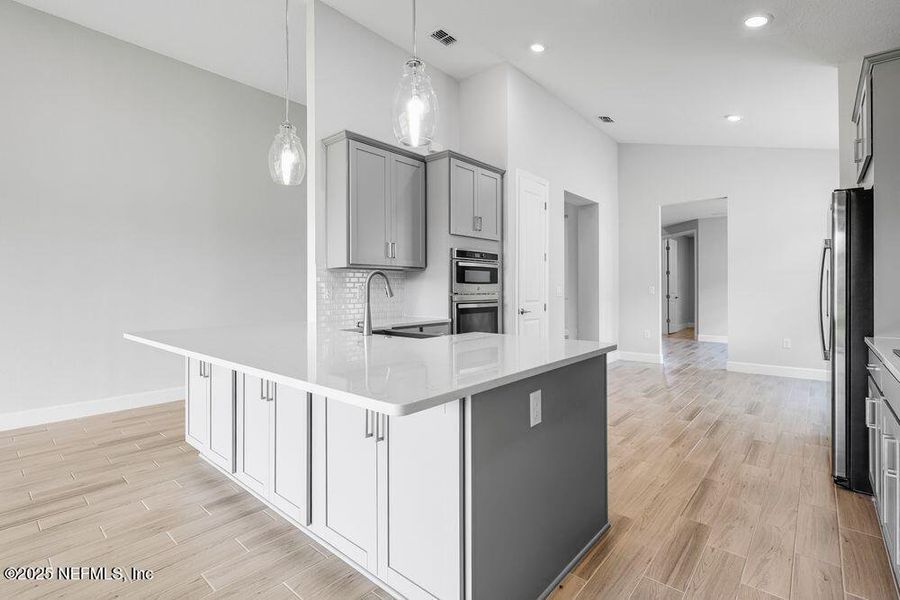 Furnished interior view inside a new home in Colbert Landings, Palm Coast (Image 5).