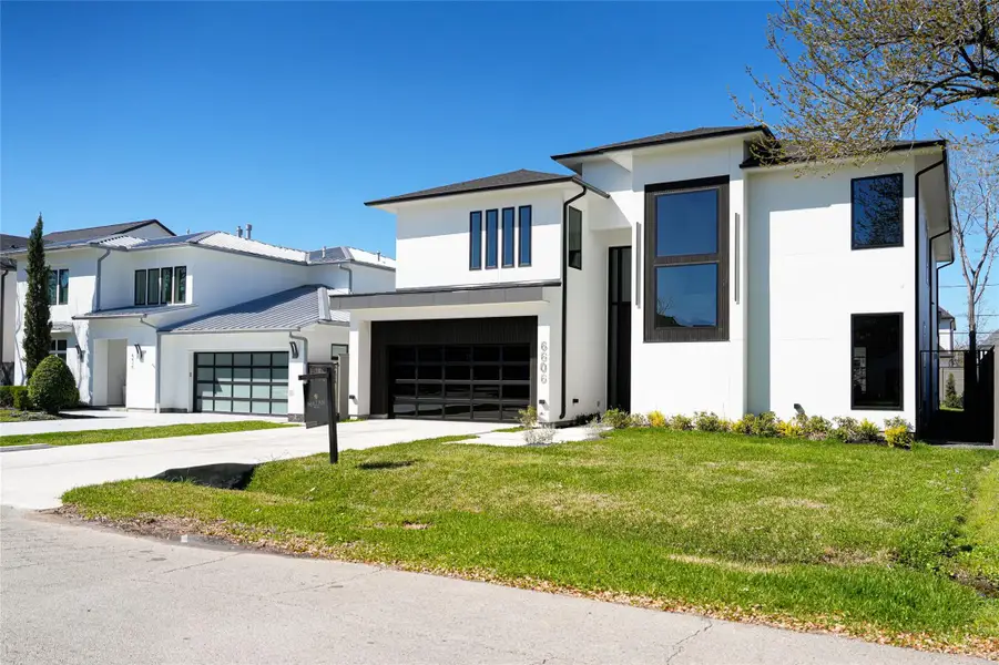 Front exterior of a new home in , Houston, TX, highlighting curb appeal (Image 1). Front exterior of a new home in , Houston, TX, highlighting curb appeal (Image 1).