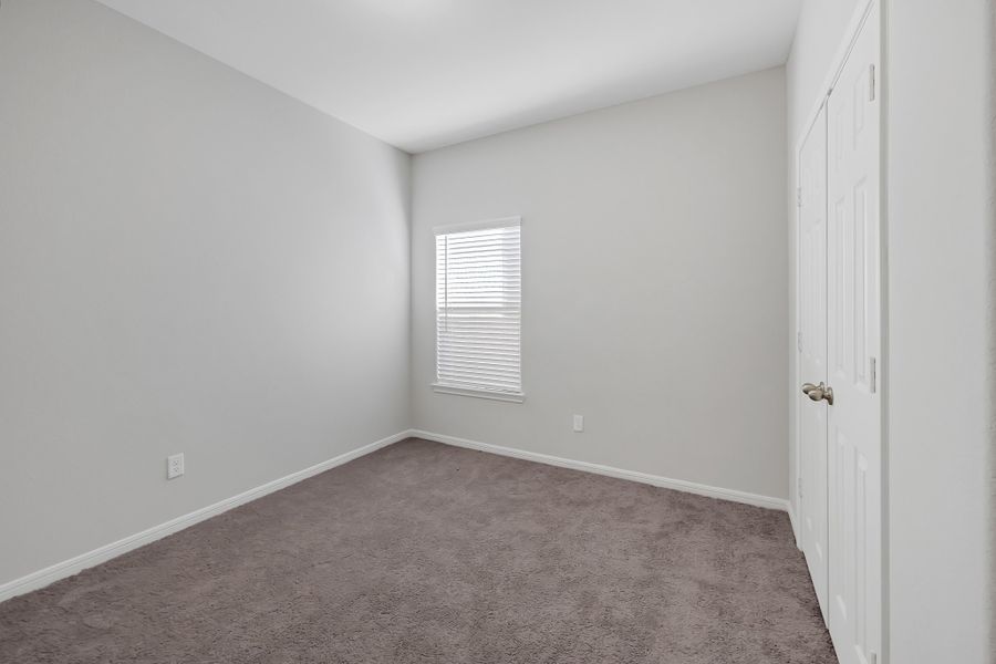 Representative unfurnished interior of a home built from the Floor Plan 1243 by Colina Homes in River Ranch, Dayton (Image 19).