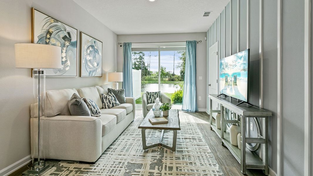 Representative furnished interior of a home built from the Osmond by D.R. Horton in Stokes Landing Express, St. Augustine (Image 9).