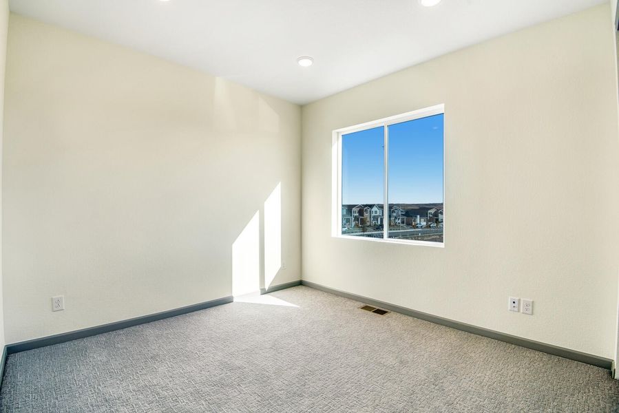 Representative unfurnished interior of a home built from the C by Tri Pointe Homes in Westside Crossing, Berthoud (Image 31).