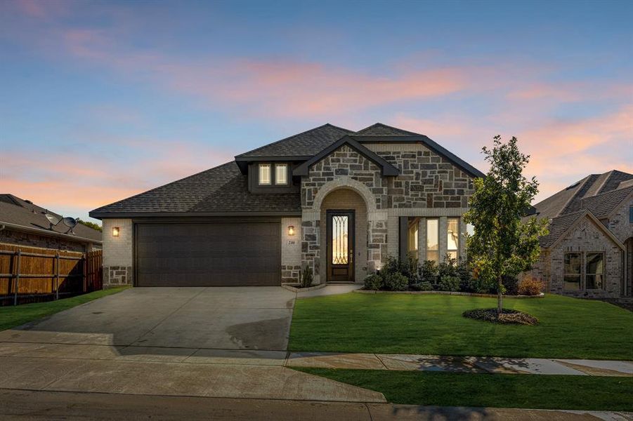 Front exterior of a new home in Sunset Ridge, Alvarado, TX, highlighting curb appeal (Image 1).