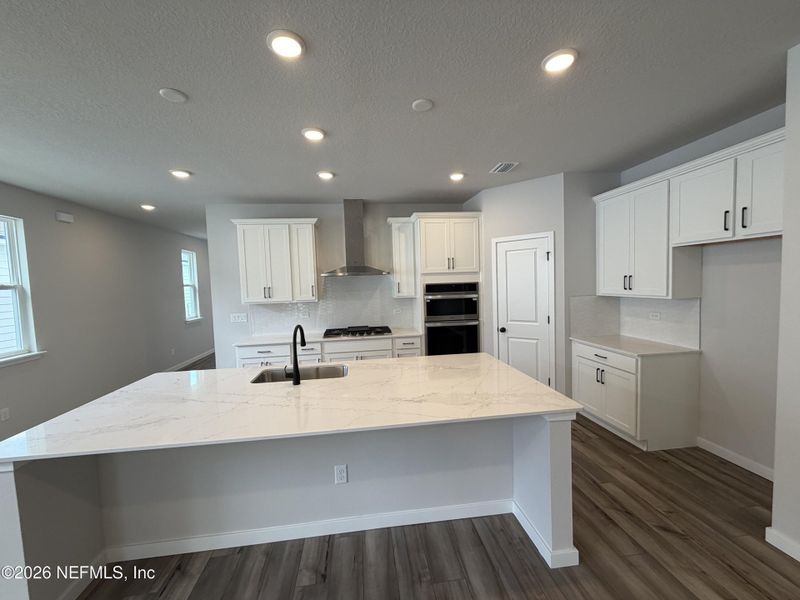 Furnished interior view inside a new home in Reserve East, Flagler Beach (Image 21).