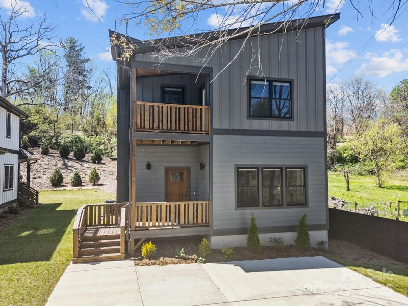 Front exterior of a new home in , Asheville, NC, highlighting curb appeal (Image 12).