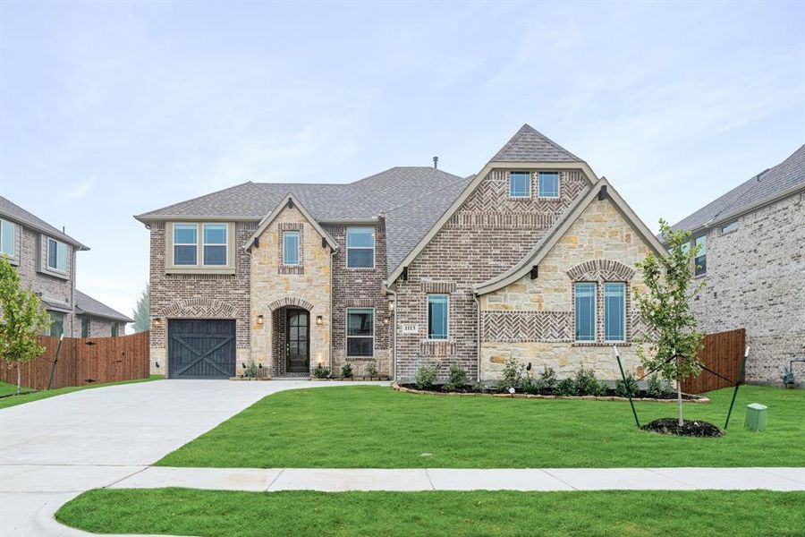 Front exterior of a new home in Mockingbird Heights Classic 60, Midlothian, TX, highlighting curb appeal (Image 20).