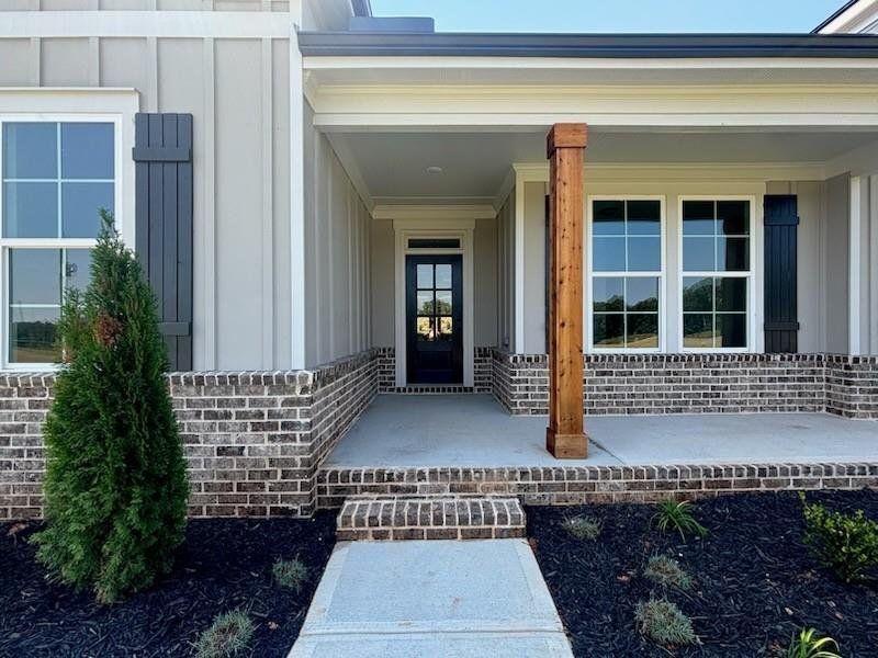 Exterior details and patio area of a home in Pinegate, Covington (Image 3). Exterior details and patio area of a home in Pinegate, Covington (Image 3).