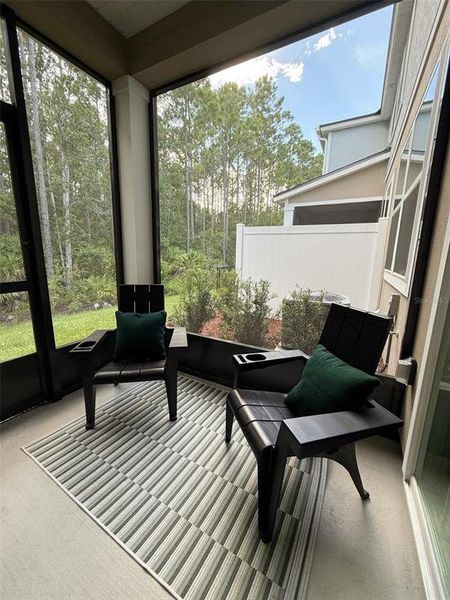 Exterior details and patio area of a home in The Trails, Palm Coast (Image 3).