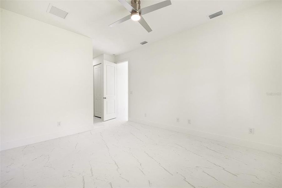 Spacious, unfurnished interior of a new home in , Port Charlotte (Image 36).