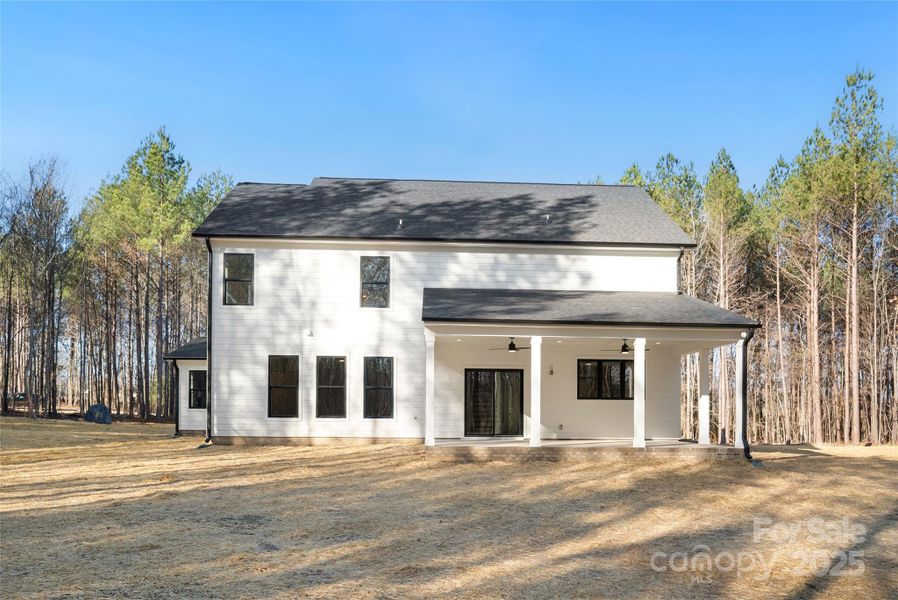 Exterior details and patio area of a home in , Wingate (Image 25).
