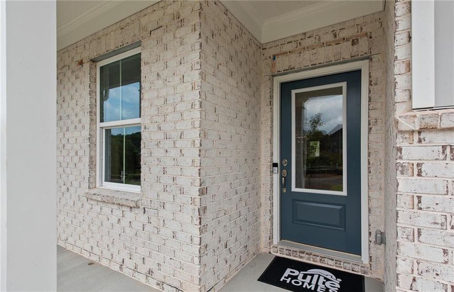Exterior details and patio area of a home in Watermist at Mirror Lake, Villa Rica (Image 25).