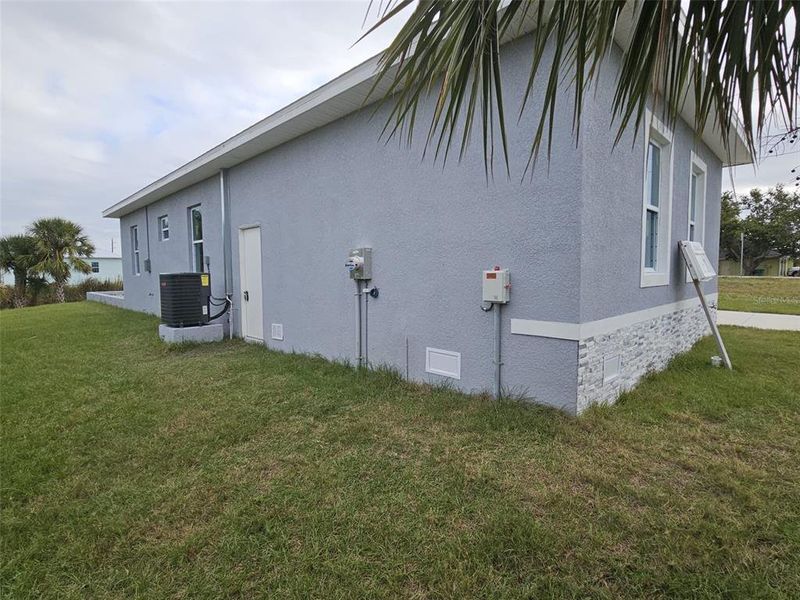 Front exterior of a new home in , Port Charlotte, FL, highlighting curb appeal (Image 2).