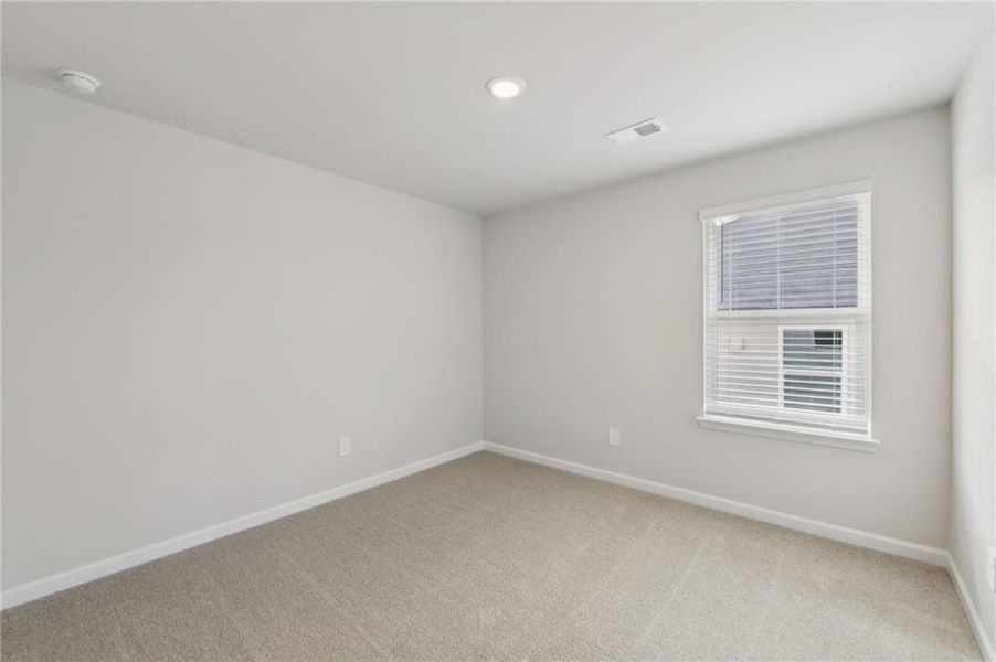 Spacious, unfurnished interior of a new home in Vines at Mill Creek - Estate Series, Braselton (Image 34). Spacious, unfurnished interior of a new home in Vines at Mill Creek - Estate Series, Braselton (Image 34).